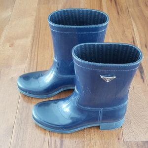 Prada dark blue boots.